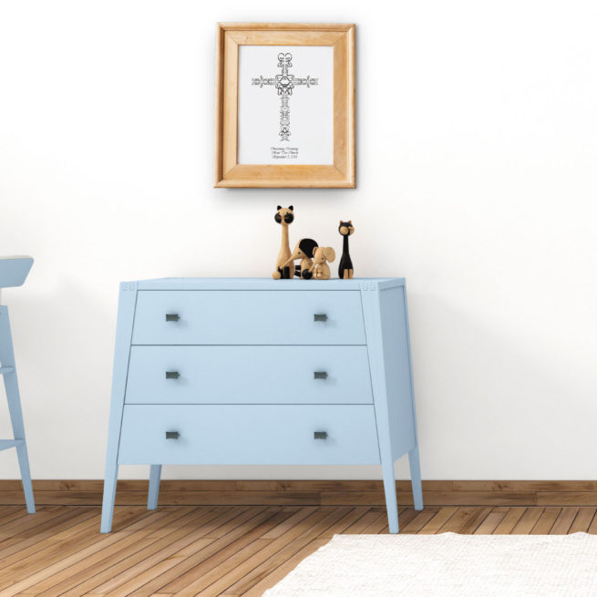 Personalized Christening Cross Frame Hanging on a Wall in a Baby's Nursery